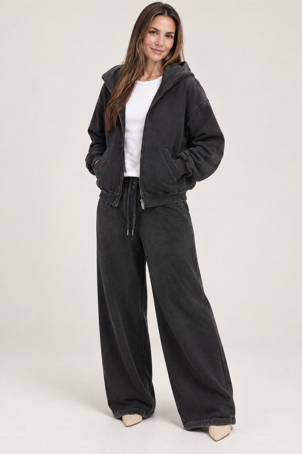 High-Neck Zip Hoodie in Washed Black, unzipped over a white T-shirt