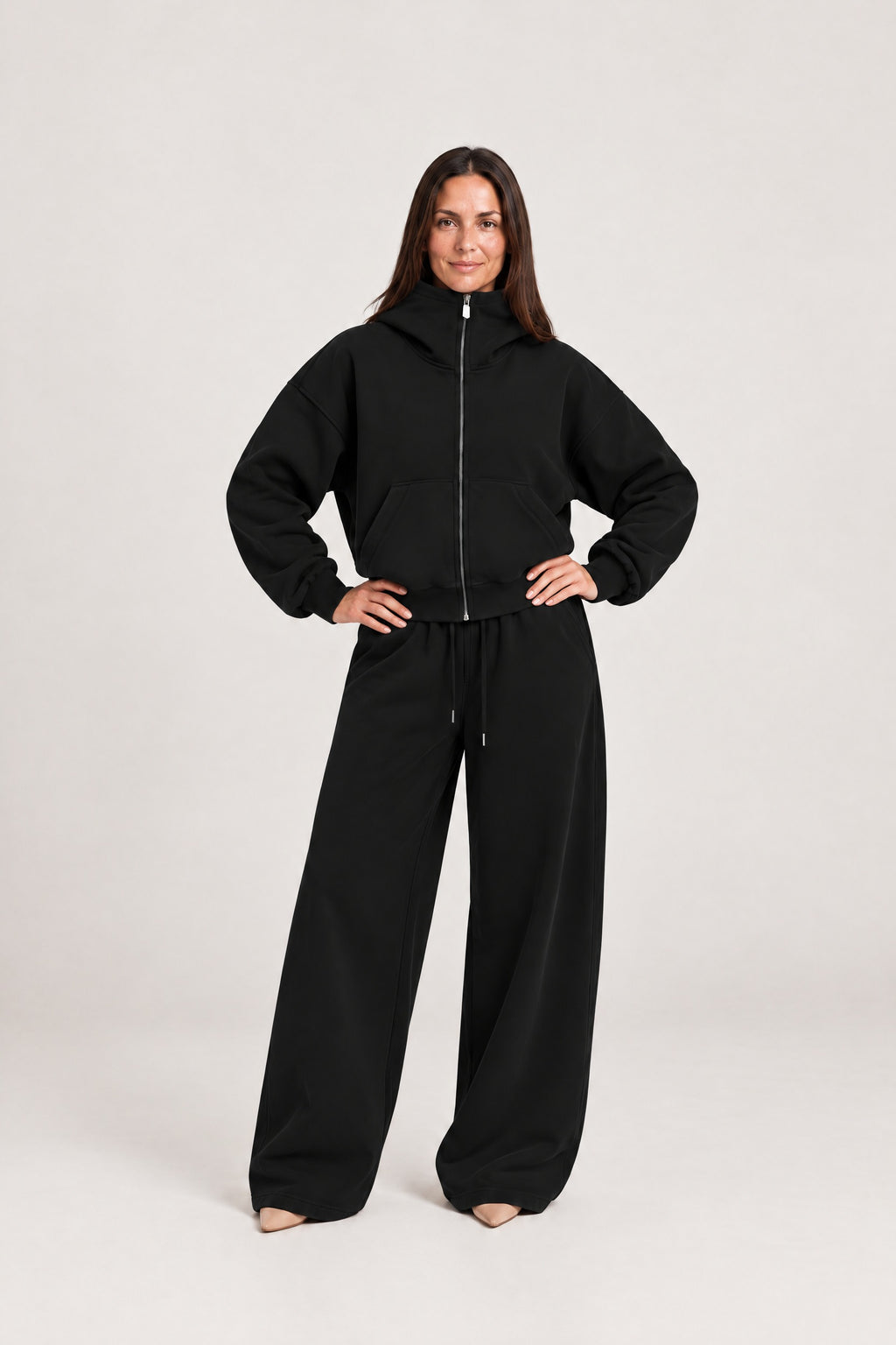 High-Neck Zip Hoodie in Black with the matching sweatpants, front