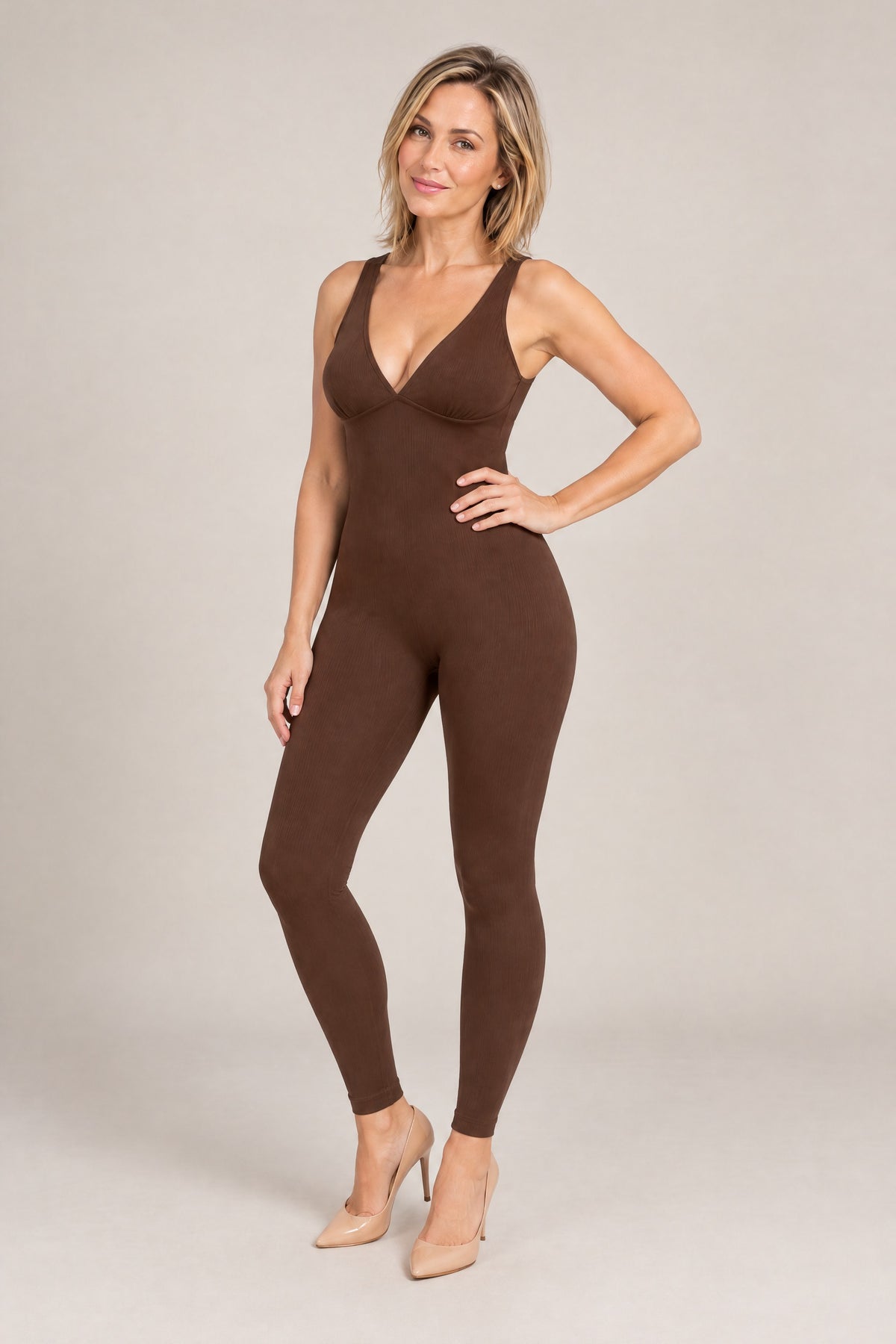 Deep-V Ribbed Jumpsuit in Brown, three-quarter front