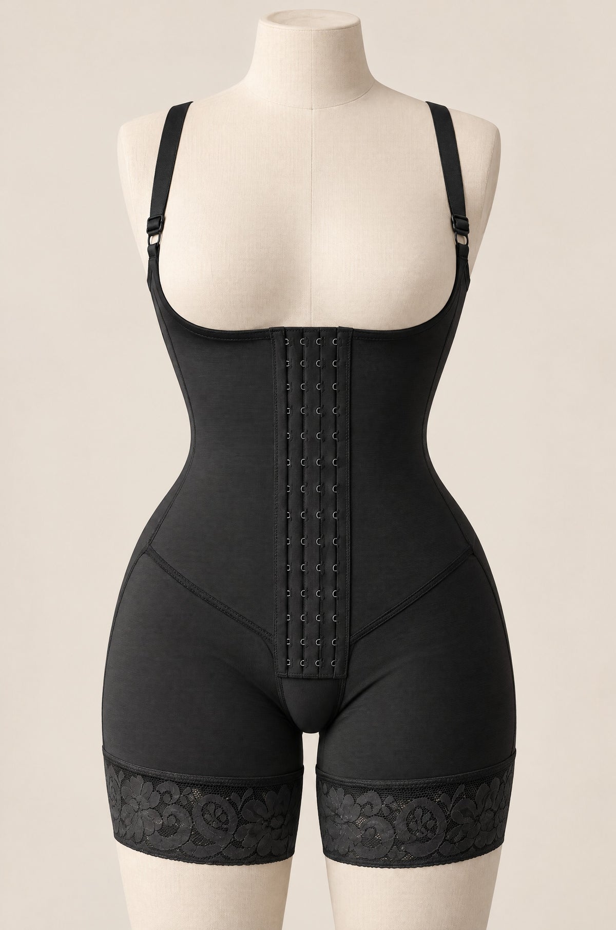 Hook-Front Bodysuit in Onyx on a dress form