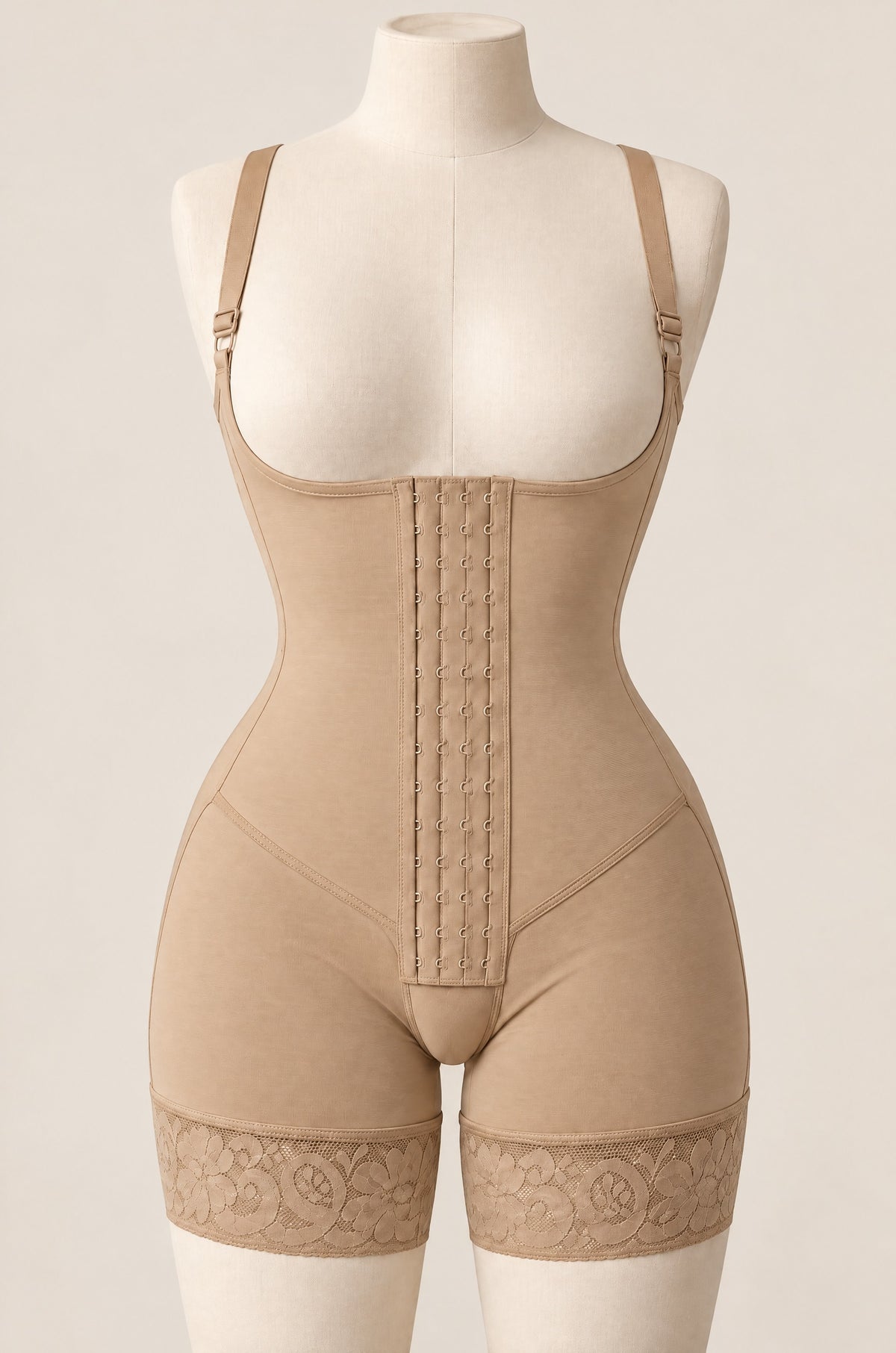 Hook-Front Bodysuit in Sand on a dress form