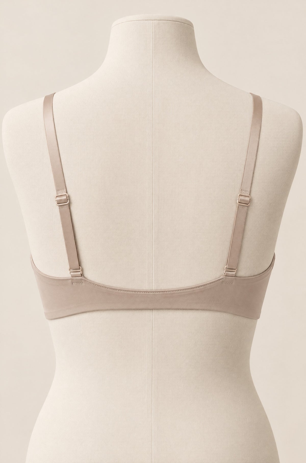 Front-Close T-Shirt Bra in Oat on a dress form, back view