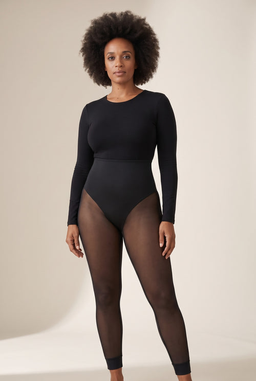 Sheer-Leg Shaping Legging in Onyx with a black long-sleeve top