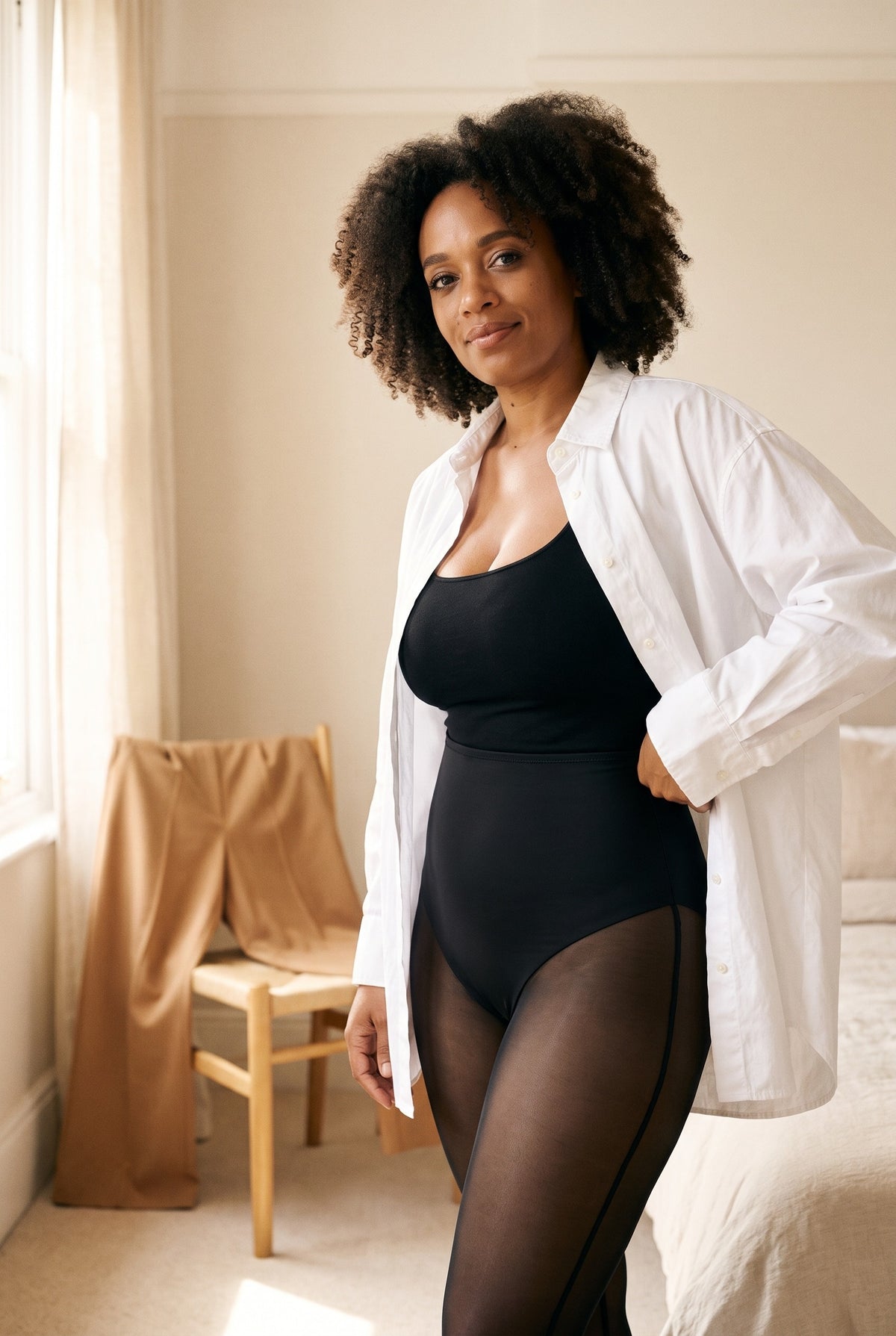 Sheer-Leg Shaping Legging in Onyx under an open white shirt