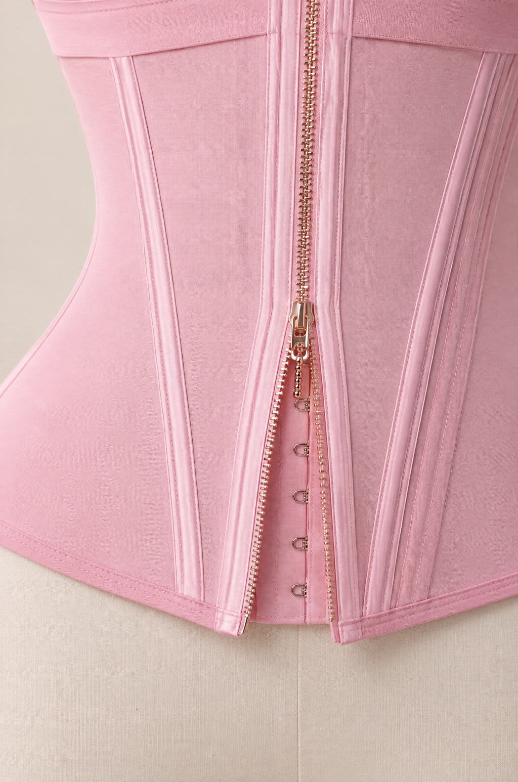 Close-up of the front zip and hook-and-eye rows