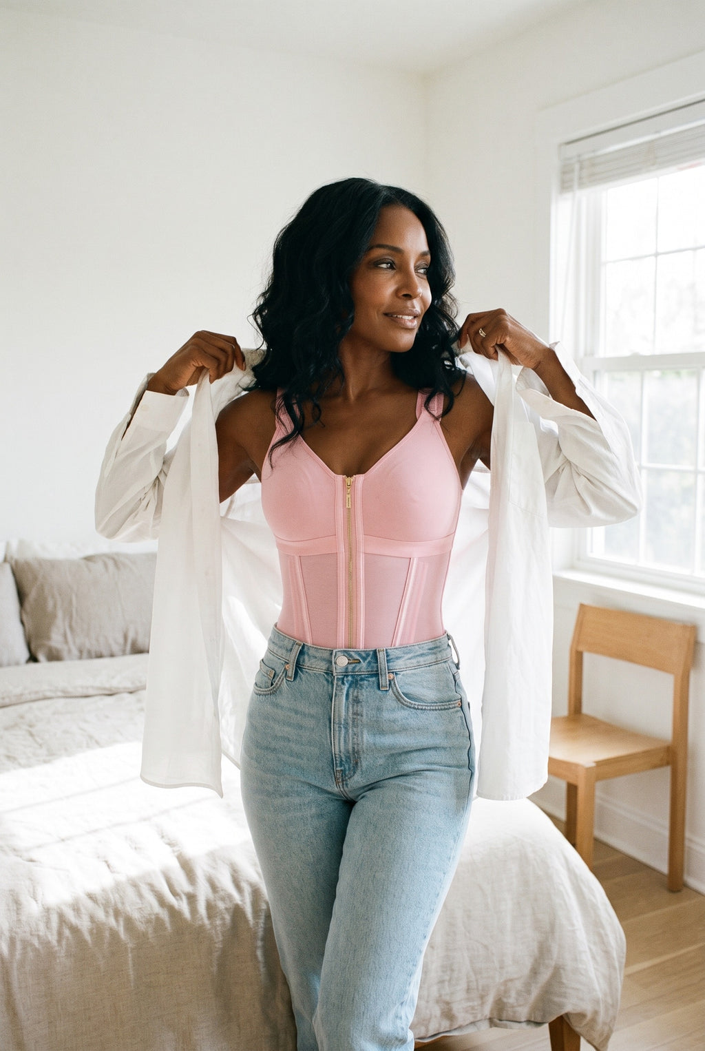 Zip-Front Shaping Vest in Pink under an open white shirt