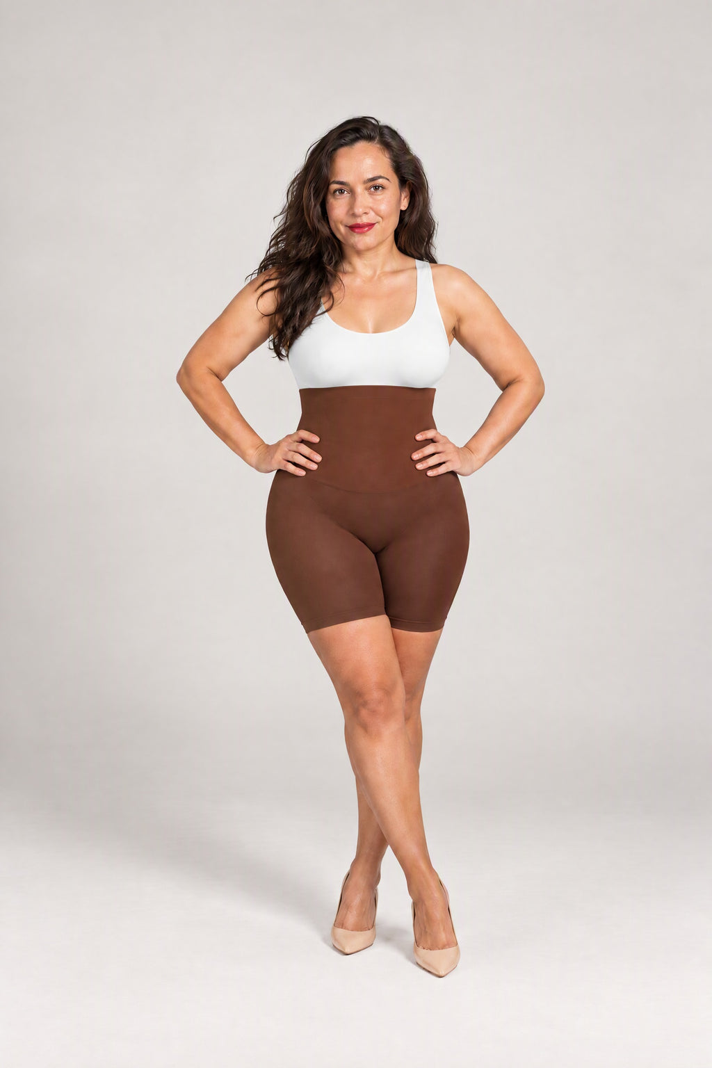 Seamless High-Waist Shaping Shorts in Brown, front, worn with a white top