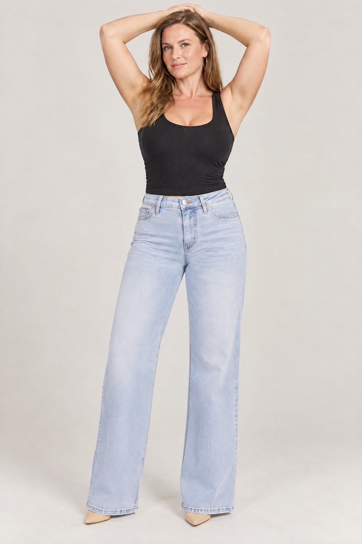 Stretch Wide-Leg Jeans in Light Blue, front with arms raised